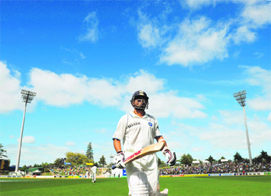 Sachin Tendulkar walks back to the pavillion after being dismissed on the third day of the first Test between India and New Zealand at the Seddon Park Stadium in Hamilton on Friday.