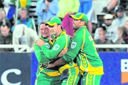 Roelof van den Merwe (L), AB de Villiers (C) and Jacques Kallis celebrate on Friday the dismissal of Callum Ferguson (not in picture).