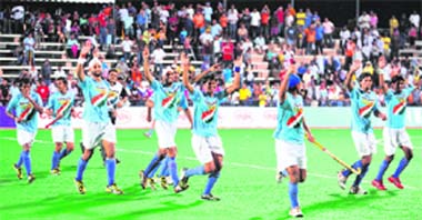 Indian team celebrates win over Malaysia. � AFP 