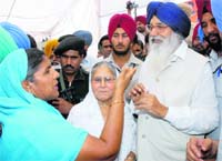 Chief Minister Parkash Singh Badal mingles with common people in Bathinda