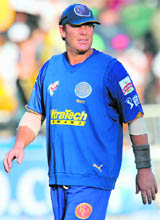 Shane Warne leaves the ground after his side's defeat against Knight Riders in Durban on Wednesday.