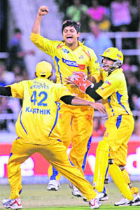 Chennai Super Kings� Suresh Raina (C) along with his team mates, celebrates the dismissal of Kings XI�s Yuvraj Singh during their match in Durban on Wedenesday.