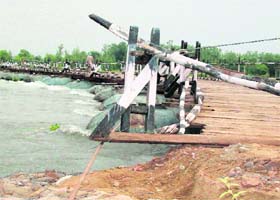 Excess water in the Sutlej damaged the Dholan wala bridge near Nurpur Bedi