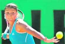 Dinara Safina returns a ball to Victoria Azarenka during their quarter final match at Roland Garros on Tuesday.