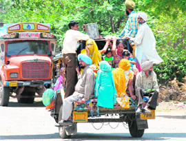 Packed full to its capacity, this autorickshaw plies on the Kharar-Kurali road in gross violation of traffic norms on Friday.
