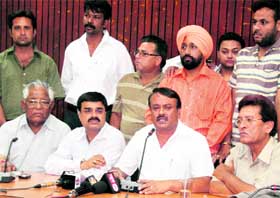 District BJP president Ravi Mahendru addresses a press conference in Jalandhar on Saturday.