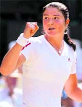Dinara Safina jubilates after winning a point against Sabine Lisicki during their quarterfinal match on Tuesday.