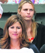 Face Value: Roger Federer�s wife Mirka Vavrenic (L) and US actress and Tommy Haas�girlfriend Sara Foster watch their match at Wimbledon on Friday. 