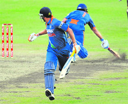 MS Dhoni completes the winning run after a hit by Yusuf Pathan on Saturday.