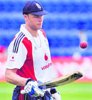 Andrew Flintoff bounces a ball on his bat during a training session in Cardiff on Tuesday.