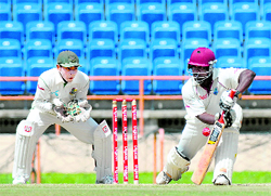 West Indies batsman Travis Dowlin plays a shot on the 3rd day of the second Test on Sunday.