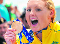 Australia�s Melissa Gorman celebrates on the podium after winning a gold in the Women�s 5km Open Water competition at the FINA World Swimming Championships in Ostia on Tuesday. 