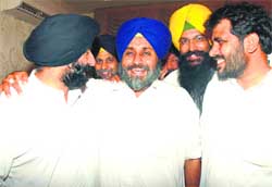 SAD chief Sukhbir Badal with Jasjit Singh Bunny, the party candidate from Banur, in Zirakpur on Thursday. NK Sharma, MC President of Zirakpur, and SAD youth president Kiranbir Singh Kang are also seen in the picture.