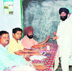 Ferozepur MP Sher Singh Ghubaya casts his vote at his village on Monday. 
