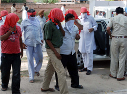 Persons who were arrested on the charge of gambling being taken to the duty magistrate in Bathinda on Sunday. 