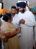 Finance Minister Manpreet Singh Badal listens to a teacher during a function at the Teachers� Home in Bathinda on Friday.