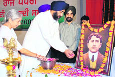 Punjab Finance Minister Manpreet Badal, along with Health Minister Laxmi Kanta Chawla, pays tributes to martyr Madan Lal Dhingra at a state-level function in Amritsar on Monday.
