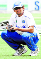 Sri Lanka�s Tillakaratne Dilshan squats during a practice session ahead of their first Test against New Zealand in Galle on Monday.