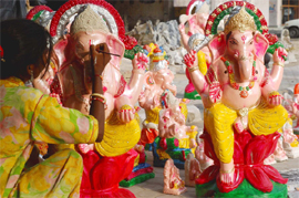 An artist giving finishing touches to an idol of Lord Ganesha ahead of �Ganesh Chaturthi� in Bathinda on Tuesday.