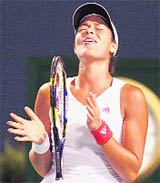 Ana Ivanovic reacts after missing a point against Lucie Safarova during their second-round match at the Rogers Cup tennis tournament in Toronto.
