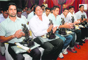 Bhima awardees during the award ceremony at Haryana Raj Bhawan in Chandigarh on Friday. 