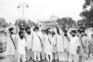 Pathis protest against the decision of the SGPC to oust them in Anandpur Sahib on Saturday.