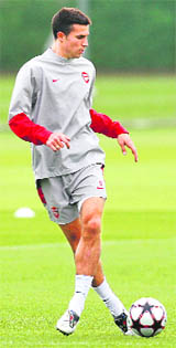 Arsenal�s Robin Van Perise practices on the eve of their Champions League qualifier match against Celtic in London on Tuesday. 