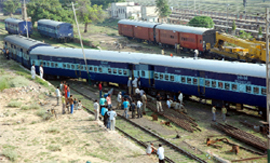 Rescue operation to put the extra coaches back on rail in progress at the Bathinda railway yard on Wednesday morning.