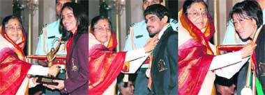 Clockwise from Right: MC Mary Kom, Sushil Kumar and Saina Nehwal recieve their awards from President Pratibha Patil in New Delhi