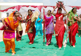 Students perform Jago, a Punjabi folk dance, during the National Special Games in Sriganganagar.