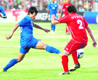 Indian captain Baichung Bhutia in action on Monday. 