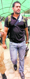 Mahendra Singh Dhoni arrives at the Chandigarh airport on Monday