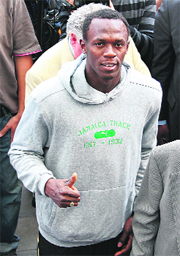 Jamaican sprinter Usain Bolt gives a thumb up after unveiling the new surface of King Baudouin stadium athletics track in Brussels on Wednesday. 