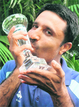 Amandeep Johl with the winners� trophy in Chandigarh on Sunday. 