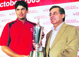 Gaganjeet Bhullar (L) and Pawan Mujal launch the trophy in Gurgaon
