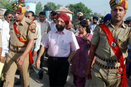 SS Khurana, Chairman, Railway Board, being escorted after he arrived at the Bathinda railway station on Sunday.