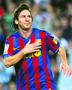 Barcelona�s Lionel Messi celebrates after scoring his second goal against Atletico Madrid during their Spanish First Division soccer match at Camp Nou stadium in Barcelona on Friday.