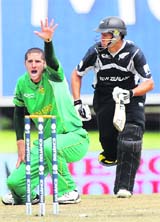 Wayne Parnell (L) appeals succesfully for Ross Taylor on Thursday.