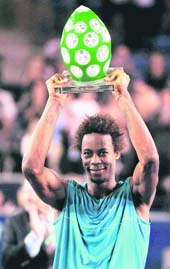 Gael Monfils holds his trophy after defeating Philipp Kohlschreiber in the final of the ATP �Open de Moselle� tennis tournament in Metz, eastern France on Sunday. 