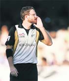  (L) and England�s captain Andrew Strauss