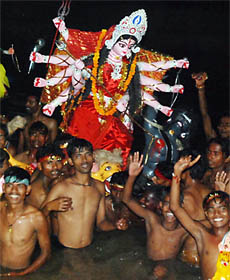 Devotees immersing an idol of Durga in Sirhind Canal in Bathinda on Tuesday.