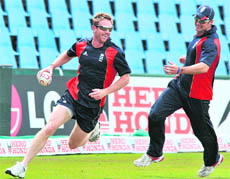 England�s Paul Collingwood (L) and Andrew Strauss take part in a training session on Thursday prior to their semifinal against Australia at SuperSport Park in Centurion.