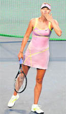 Maria Sharapova blows a kiss after defeating Iveta Benesova on Thursday. 