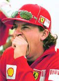Ferrari Formula One driver Kimi Raikkonen of Finland yawns at his paddock area ahead of the Japanese F1 Grand Prix in Suzuka on Thursday.