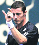 Marat Safin reacts during his second round match against Marco Chiudinelli at Thailand Open tournament in Bangkok on Thursday.
