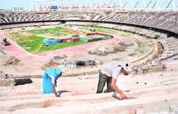 Construction work goes on at the Jawahar Lal Nehru Stadium in New Delhi.