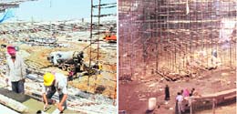 Construction goes on at the National Stadium (L) and the Talkatora swimming pool. 