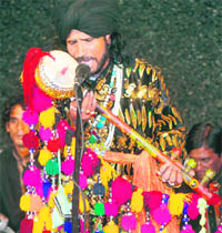 Pakistani folk singer Sai Zahoor presents an item at the South Asia Foundation Peace Festival in Amritsar on Tuesday.