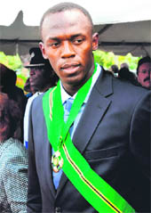 Triple record holder, Jamaica�s sprinter Usain Bolt, is pictured with the Order of Jamaica, the country's fourth- highest honour, after being decorated in Kingston on Monday. 