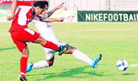 JCT�s Baljit Sahni takes a shot against Churchill Brothers at Ludhiana on Friday.